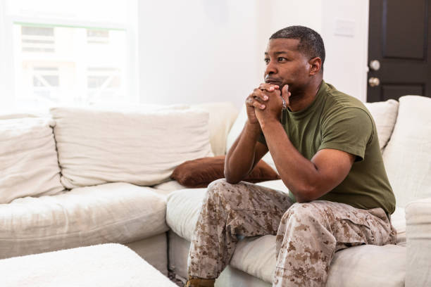 istock Mature male soldier struggles with PTSD alone 1531058968