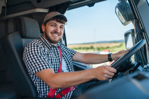 istock Smiling truck driver looking at the camera. 1531074098