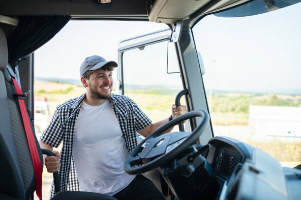 istock Truck driver getting in his truck. 1531074329