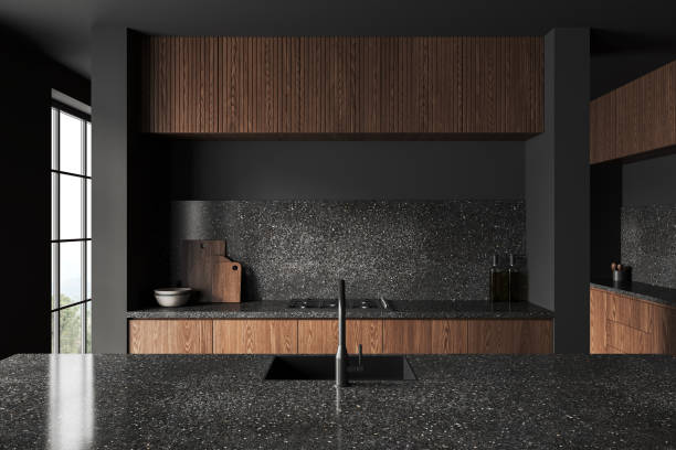 istock Grey kitchen interior with bar countertop and cooking space with window 1531083923