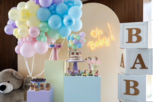 party decoration with pink and blue balloons in a restaurant