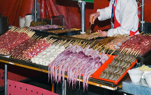 Exotic Food, Traditional Chinese Street Food at the Night Market, Wangfujing Street, Beijing, China