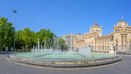 Summer Mornings Unveiled: Zorrilla Square's Enchanting Fountain View