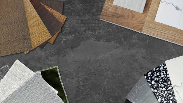 istock interior material samples including wooden laminated and vinyl flooring tiles swatch, marble stone quartz swatch, fabric draperies, ceramic tile placed on dark black marble stone. mood and tone board. 1531155132