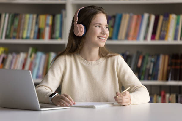 istock Beautiful university student prepares for exam use modern tech 1531191607