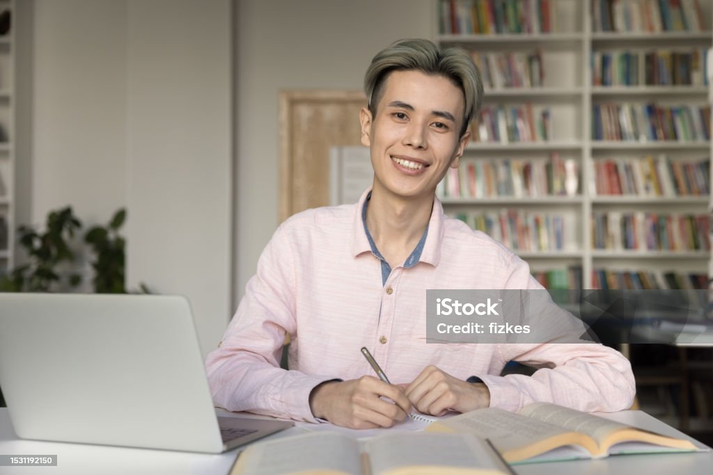 Assignment Guys Asian Guy First Year University Student Prepare Assignment In Library ...