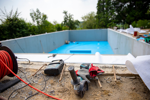 Swimming pool construction. Copy space