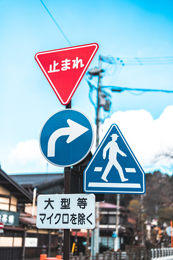 Traffic signs indicating no parking and towing areas in Korean