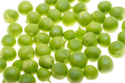 green young peas isolated on white background