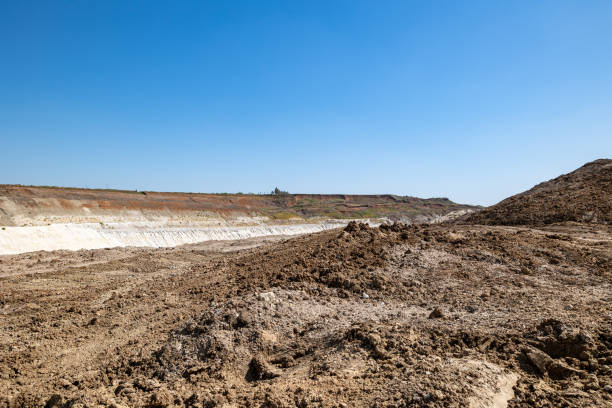istock Quarry extraction porcelain clay(kaolin) and quartz sand in the open pit mine. 1531244940