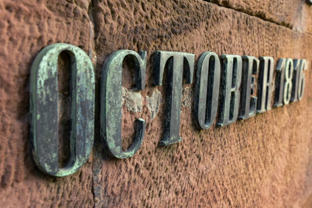 istock Steel letters on the stone. Word - October 1531263751