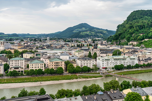 Aerial view of the historic city of Salzburg with Hohensalzburg Fortress in beautiful evening light in fall, Salzburger Land, Austria.