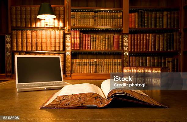 Laptop In Classic Library Stock Photo - Download Image Now - Law, Book, Computer