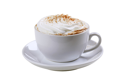 Cup of cappuccino with cream and nutmeg