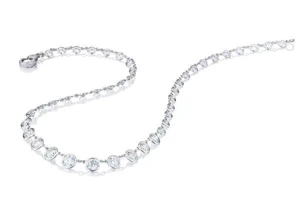 Photo of A diamond necklace on a white background