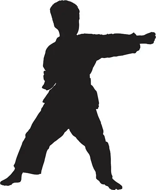 Vector illustration of Vector of a karate child exercising