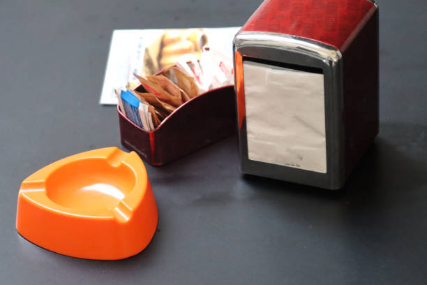 Handmade wooden coconut ashtray with a cigarette