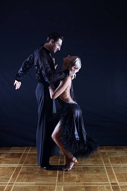 istock dancers in ballroom against black background 153140471