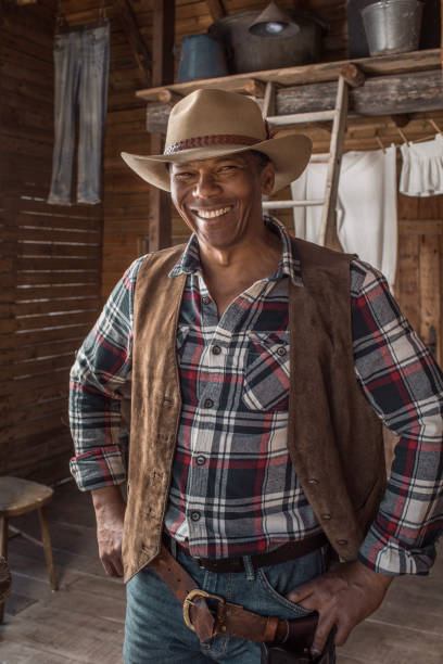istock Handsome Black Cowboy in an authentic wild west setting 1531414046