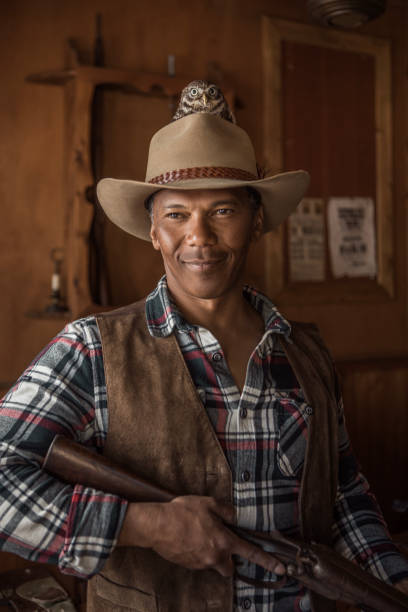 istock Handsome Black Cowboy in an authentic wild west setting 1531416806