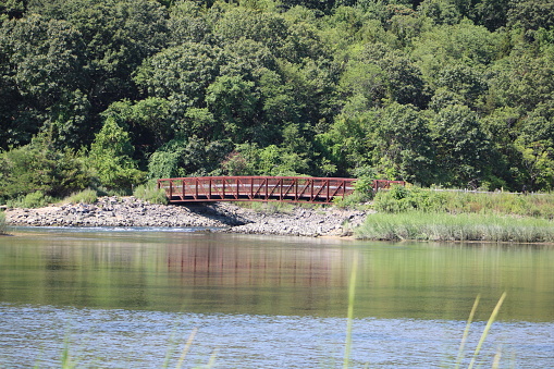 Looking across the river to the beautiful red bridge at Sunken Meadow State Park.