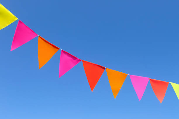istock Colorful pennant string decoration against summer sky 1531452679