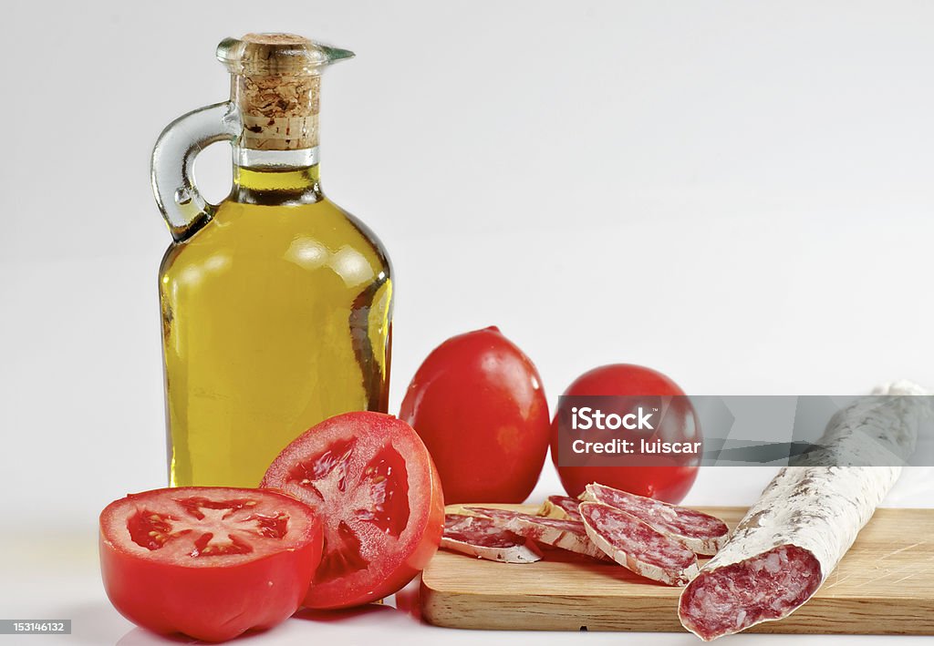 Tomaten, Olivenöl und salami - Lizenzfrei Abnehmen Stock-Foto