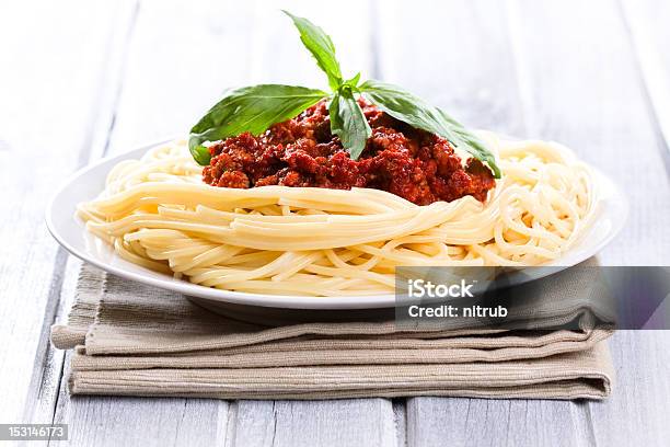 Bolognese Spaghetti Stock Photo - Download Image Now - Basil, Bolognese Sauce, Crockery