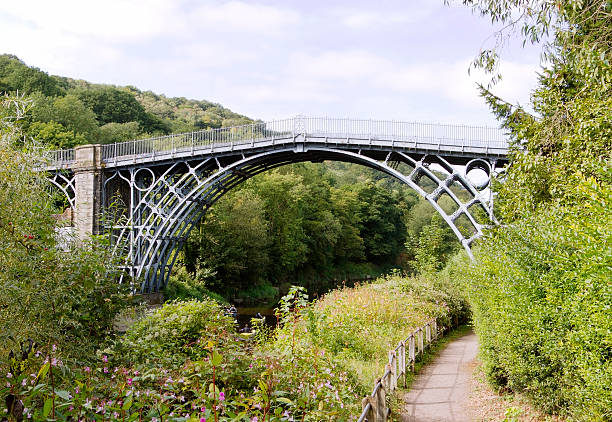 Iron Bridge over the River Severn, Shropshire The Iron Bridge over the River Severn, Ironbridge Gorge, Shropshire, England. ironbridge shropshire stock pictures, royalty-free photos & images