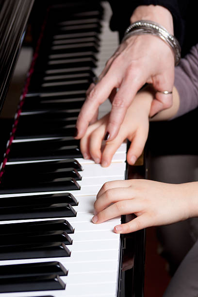 Piano lesson stock photo