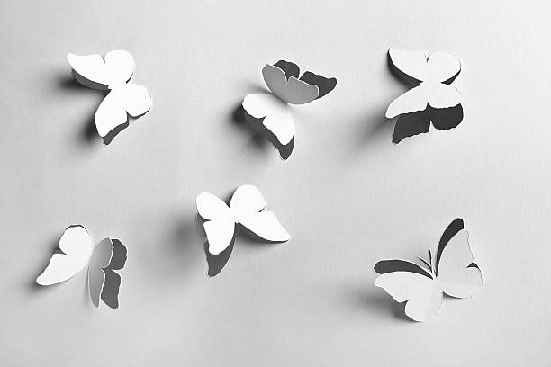 istock white abstract paper cutout butterflies 153146757