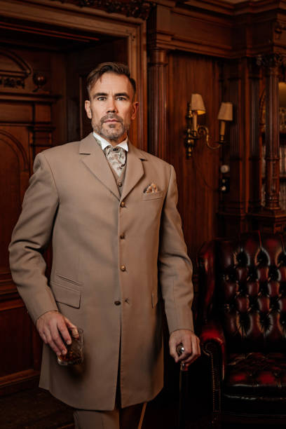 istock A handsome elegant 1920s style gentleman in a luxury stately home 1531471284