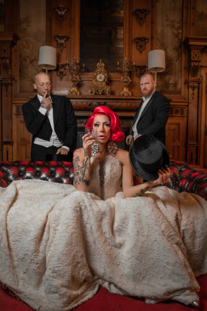 istock A beautiful elegant 1920s style redhead drag queen with chaperones 1531476716