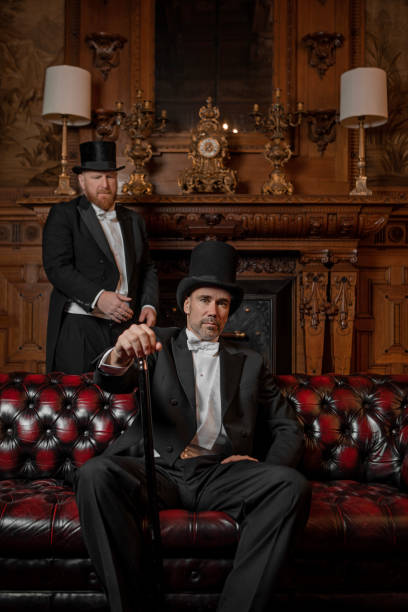 istock Two handsome 1920s style gentlemen in a luxury brown bar 1531477232