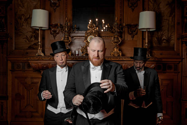 istock Three handsome 1920s style gentlemen in a drawing room 1531482019