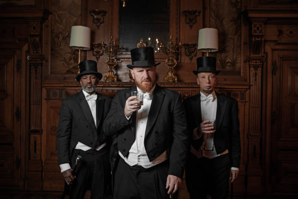 istock Three handsome 1920s style gentlemen in a drawing room 1531482021