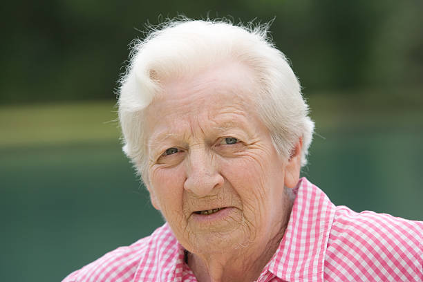 istock Old Woman Outside 153148467
