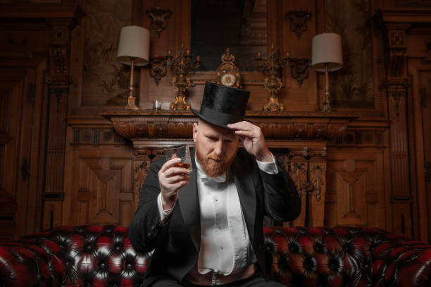 istock A handsome elegant 1920s style gentleman in a luxury stately home 1531485647