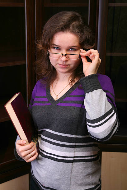 Pretty brunet girl with book. stock photo