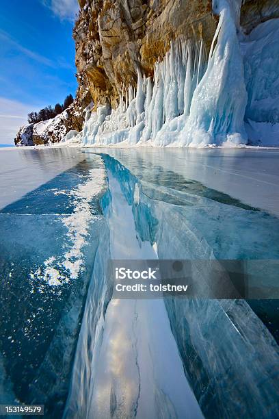Big Crack In The Ice Of A Lake Stock Photo - Download Image Now - Melting, Snow, At The Edge Of