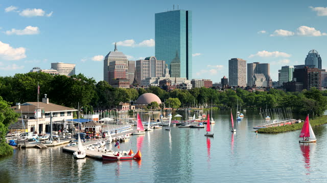 Boston Massachusetts USA downtown city skyline and boat marina on the Charles River