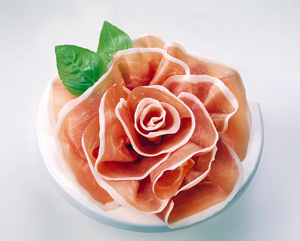 Rose of Parma ham Prosciutto of Parma composed as a flower parma ham stock pictures, royalty-free photos & images