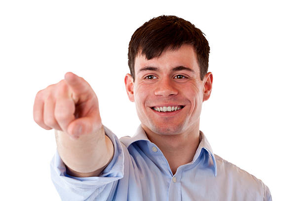istock Young happy handsome man pointing with finger 153150452