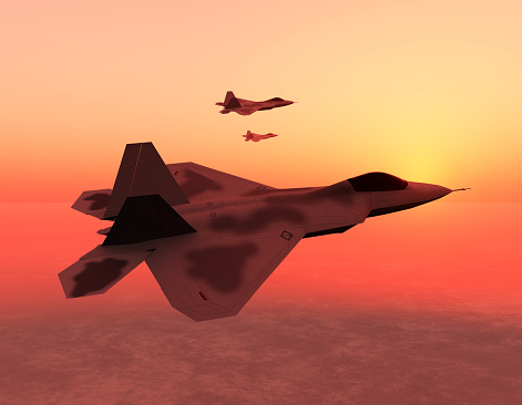 Sunset finds a squadron unit of fighter jets on patrol over the environment.