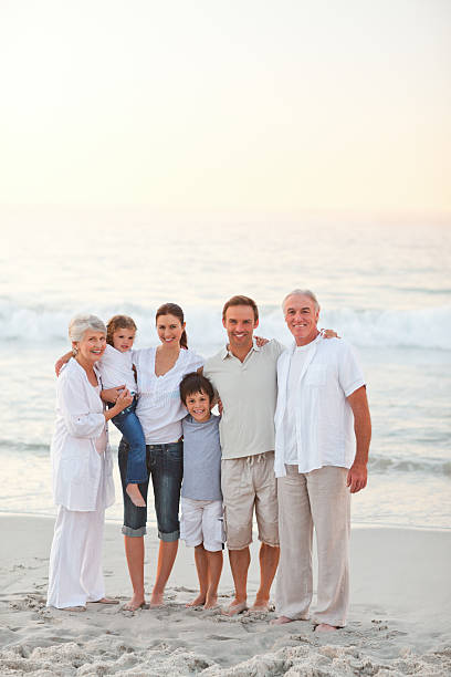 istock Beautiful family at the beach 153151468