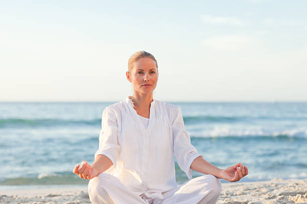 istock Peaceful woman practicing yoga 153151642