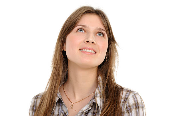 istock Smiling the girl looking upwards 153151689