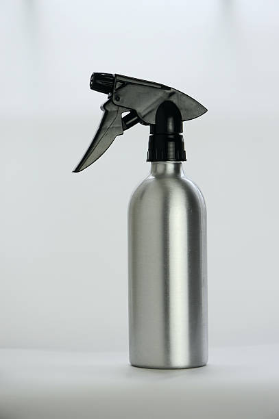 Spray bottle stock photo