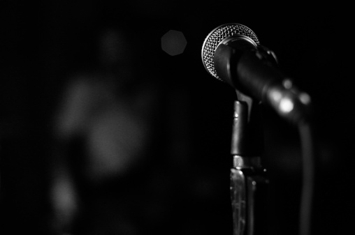 A microphone is seen on a black and white picture during a performance in a night club in Thessaloniki, Greece.