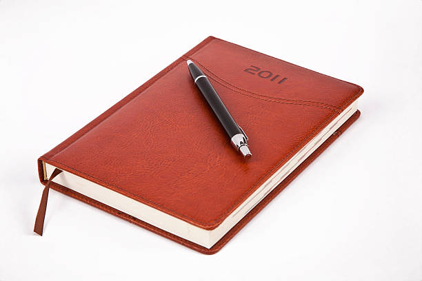 istock black pen on leather calendar 153155099